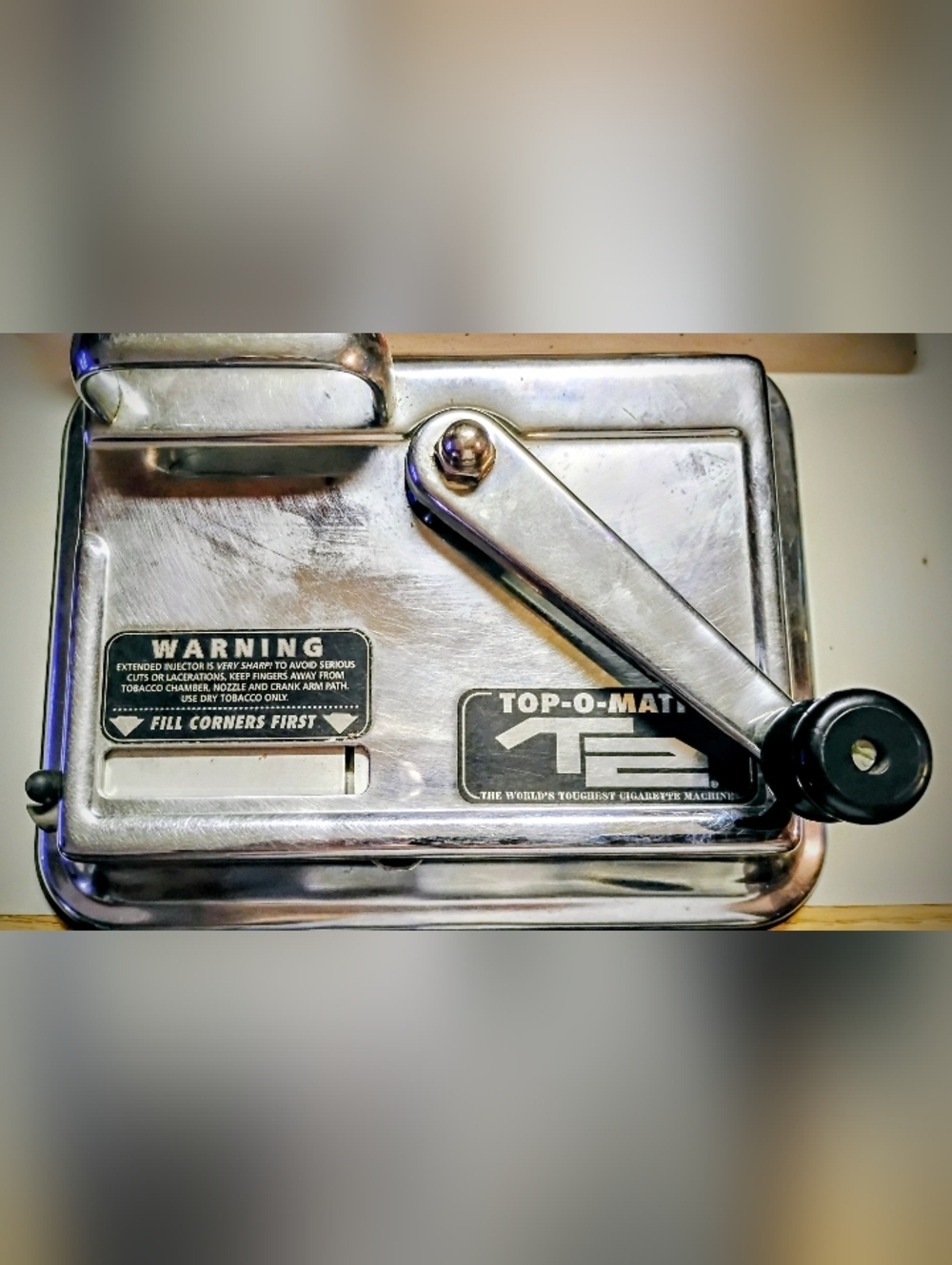 Top-O-Matic Chrome Cigarette Rolling Machine with Black Handle